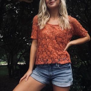 “Coveted Clothing” Burnt Red Orange Lace Tee